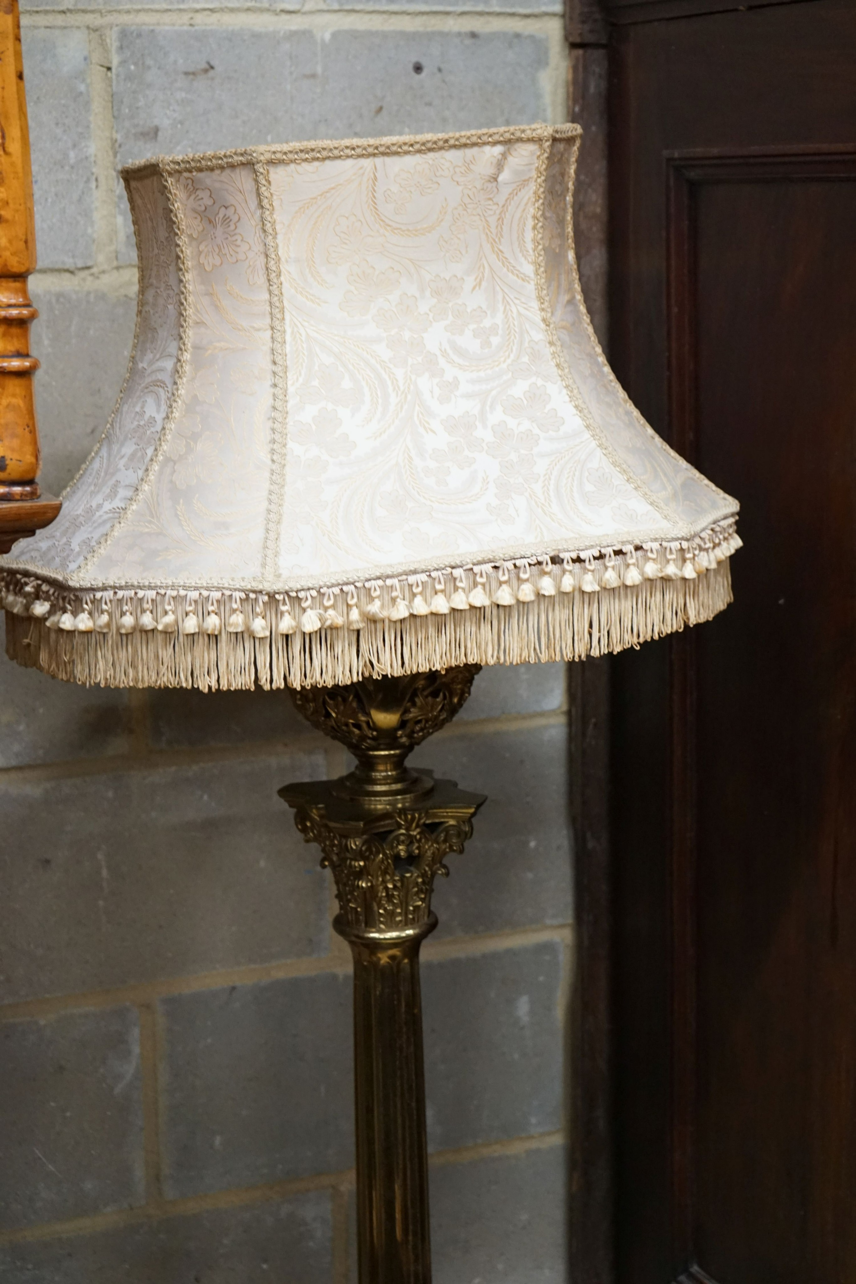 A late Victorian lacquered brass corinthian column oil lamp standard, converted to electricity, height excluding shade 144cm